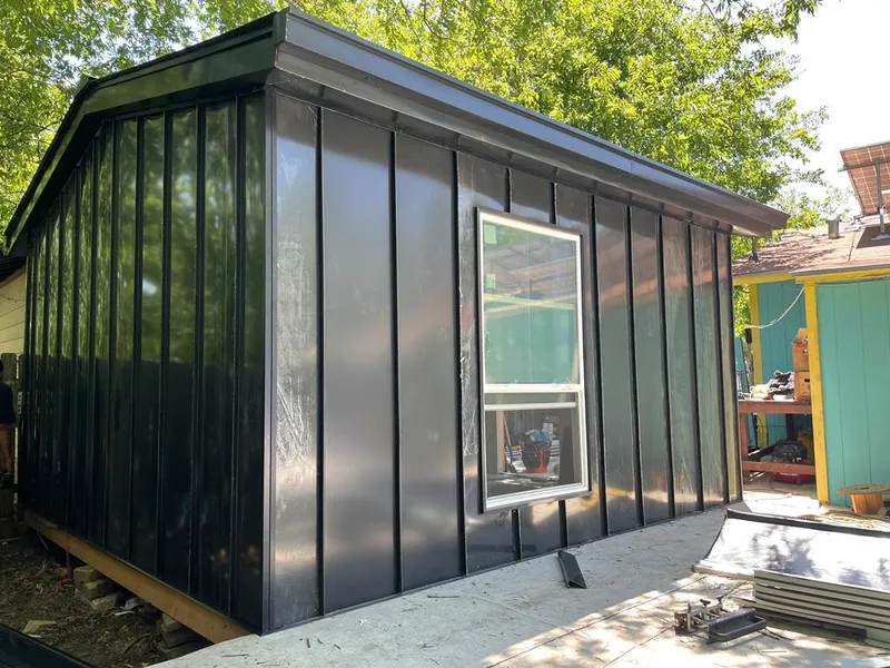 Black standing seam metal wall panels for Roof Inspection in Marion